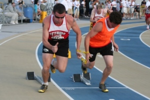 Jon Dunkerley (on left) & Guide Coming out of the starting blocks at a track race